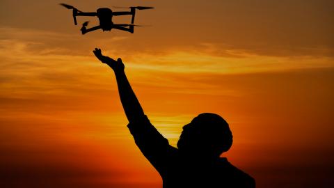 Man with drone in hand